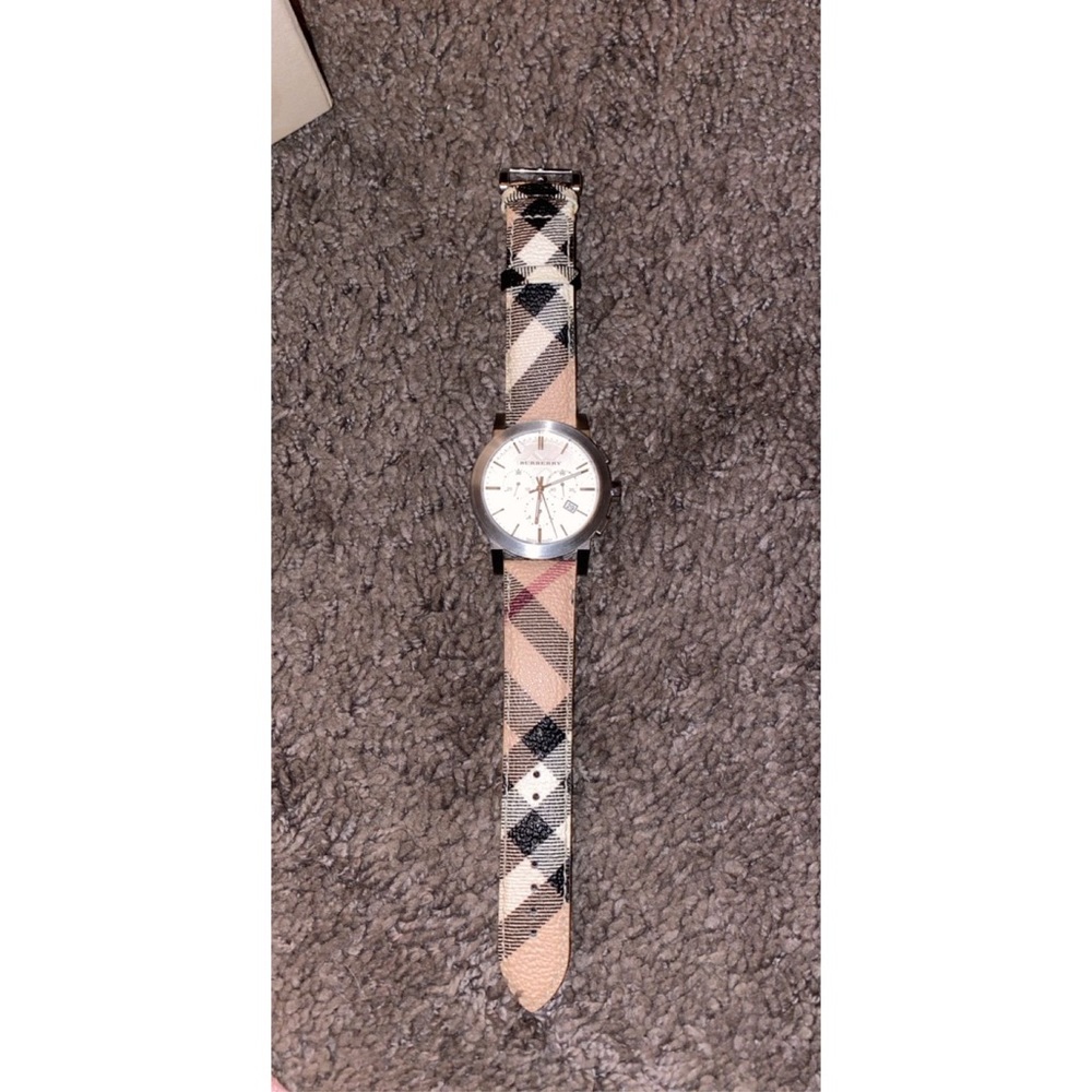 Burberry unisex watch. Used with Box.